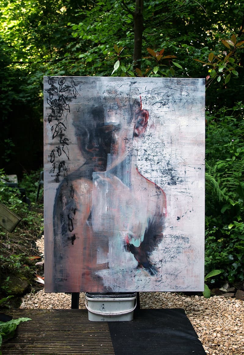 A painting of a person’s head and torso